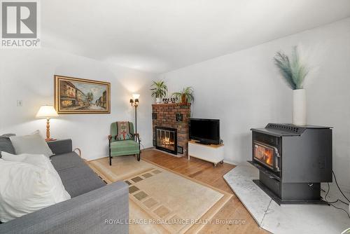 430 Lakeside Drive, Prince Edward County (Hillier), ON - Indoor Photo Showing Living Room With Fireplace