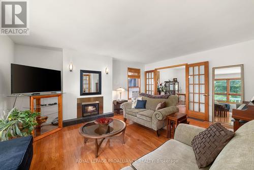 430 Lakeside Drive, Prince Edward County (Hillier), ON - Indoor Photo Showing Living Room With Fireplace