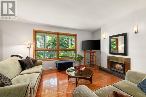 430 Lakeside Drive, Prince Edward County (Hillier), ON - Indoor Photo Showing Living Room With Fireplace