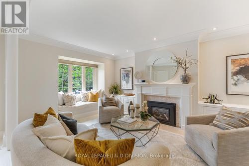 10 Glencairn Avenue, Toronto, ON - Indoor Photo Showing Living Room With Fireplace