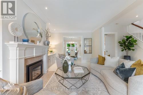 10 Glencairn Avenue, Toronto, ON - Indoor Photo Showing Living Room With Fireplace