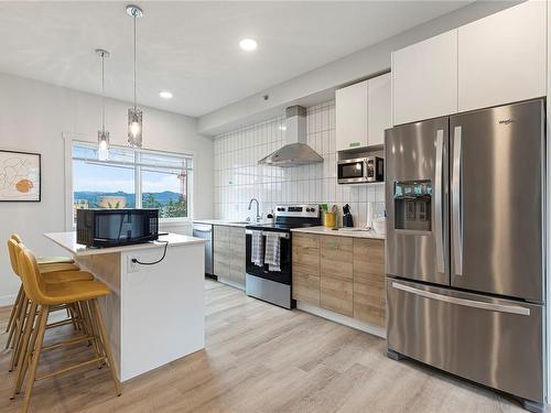 108-4820 Cedar Ridge Pl, Nanaimo, BC - Indoor Photo Showing Kitchen With Stainless Steel Kitchen With Upgraded Kitchen