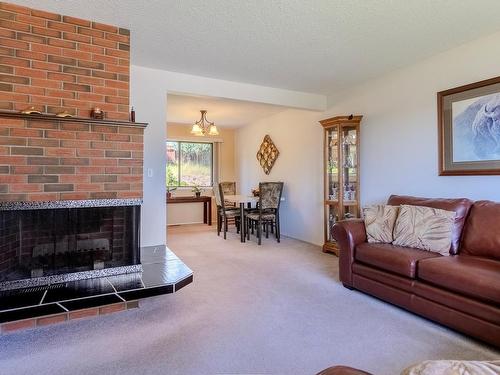 310 Cinnibar Crt, Logan Lake, BC - Indoor Photo Showing Living Room With Fireplace