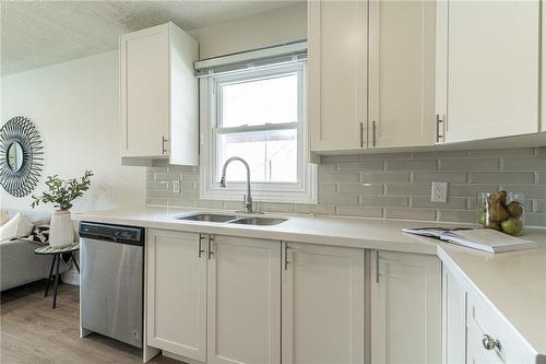 609 Mohawk Road E, Hamilton, ON - Indoor Photo Showing Kitchen With Double Sink With Upgraded Kitchen