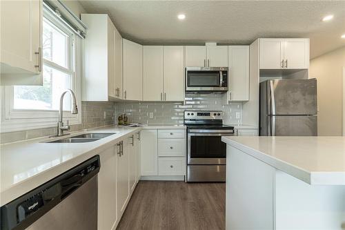 609 Mohawk Road E, Hamilton, ON - Indoor Photo Showing Kitchen With Double Sink With Upgraded Kitchen