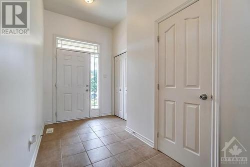 A warm and spacious foyer will welcome you home. - 972 Linaria Walk, Ottawa, ON - Indoor Photo Showing Other Room