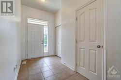 A warm and spacious foyer will welcome you home. - 