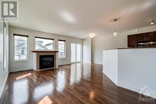 Spacious open concept living design - 972 Linaria Walk, Ottawa, ON - Indoor Photo Showing Living Room With Fireplace