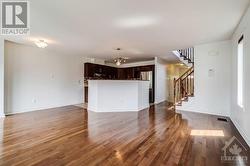 Looking towards dining room and kitchen. - 