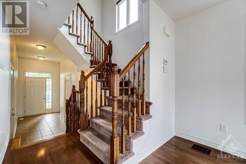 Beautiful spiral staircase - 972 Linaria Walk, Ottawa, ON - Indoor Photo Showing Other Room