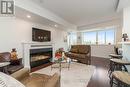 208 - 200 Halton Hills Drive, Halton Hills (Georgetown), ON  - Indoor Photo Showing Living Room With Fireplace 