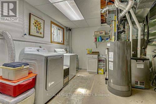 Laundry Room with Owned Water Heater and Heat Pump - 33 Hillhead Road, London, ON - Indoor Photo Showing Laundry Room