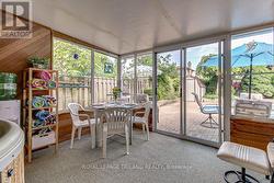 Interior View of Sunroom Dining Area - 