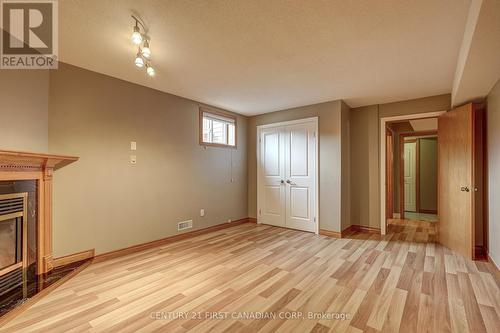 216 Highbury Avenue N, London, ON - Indoor Photo Showing Other Room With Fireplace