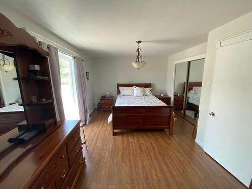 Master bedroom - 212 Rue Tremblay, Saint-Siméon, QC - Indoor Photo Showing Bedroom