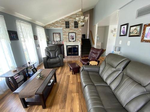 Salon - 212 Rue Tremblay, Saint-Siméon, QC - Indoor Photo Showing Living Room With Fireplace