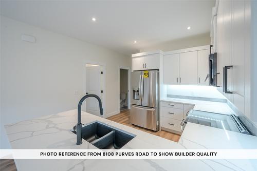 101-8104 Purves Road, Summerland, BC - Indoor Photo Showing Kitchen With Double Sink