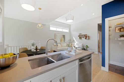 1-726 Coopland Crescent, Kelowna, BC - Indoor Photo Showing Kitchen With Double Sink