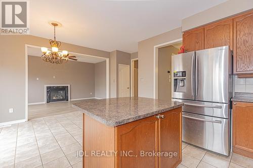 1477 Cordick Street, Oshawa (Taunton), ON - Indoor Photo Showing Kitchen With Fireplace