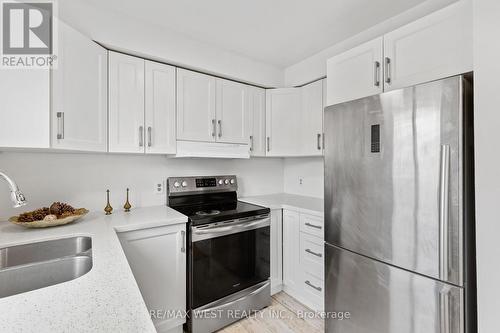 32 - 1430 Jalna Boulevard, London, ON - Indoor Photo Showing Kitchen With Stainless Steel Kitchen With Double Sink