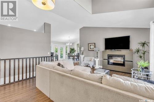 1570 Cartwright Street, Furdale, SK - Indoor Photo Showing Living Room With Fireplace