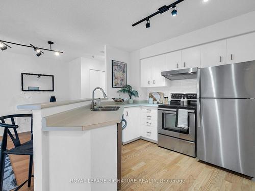 601-25 Grenville St, Toronto, ON - Indoor Photo Showing Kitchen With Double Sink
