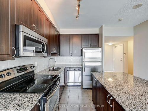 1709-1940 Ironstone Dr, Burlington, ON - Indoor Photo Showing Kitchen With Stainless Steel Kitchen With Double Sink With Upgraded Kitchen