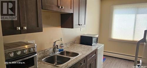 303 710 Melrose Avenue, Saskatoon, SK - Indoor Photo Showing Kitchen With Double Sink