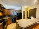 1116 - 7495 Columbia Avenue, Radium Hot Springs, BC  - Indoor Photo Showing Kitchen With Double Sink 