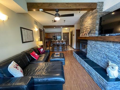 1116 - 7495 Columbia Avenue, Radium Hot Springs, BC - Indoor Photo Showing Other Room With Fireplace