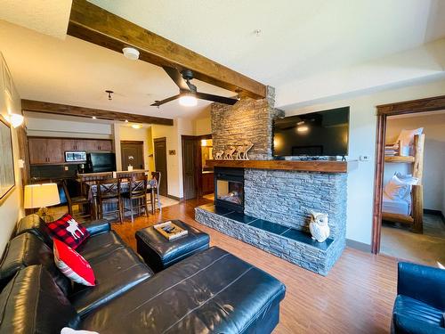 1116 - 7495 Columbia Avenue, Radium Hot Springs, BC - Indoor Photo Showing Living Room With Fireplace