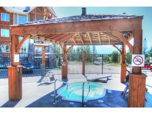 1116 - 7495 Columbia Avenue, Radium Hot Springs, BC - Outdoor With In Ground Pool With Deck Patio Veranda