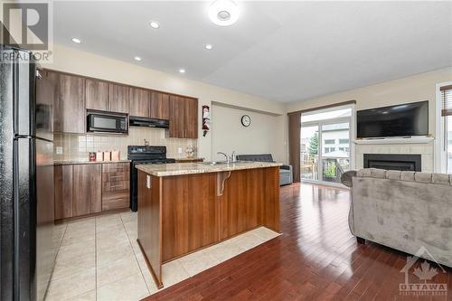 102 Popplewell Crescent, Ottawa, ON - Indoor Photo Showing Other Room With Fireplace