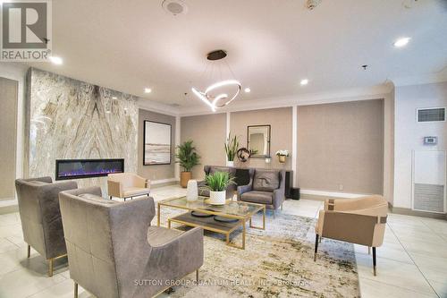 903 - 75 King Street E, Mississauga, ON - Indoor Photo Showing Living Room With Fireplace