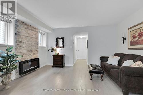 50 - 3200 Singleton Avenue, London, ON - Indoor Photo Showing Living Room With Fireplace