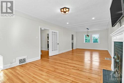 Second Floor -Living Room - 22-24 Byron Avenue, Ottawa, ON - Indoor Photo Showing Other Room With Fireplace