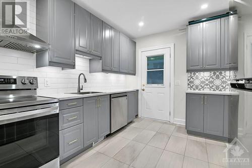 Second Floor -Kitchen (door to rear stairs) - 22-24 Byron Avenue, Ottawa, ON - Indoor Photo Showing Kitchen With Upgraded Kitchen