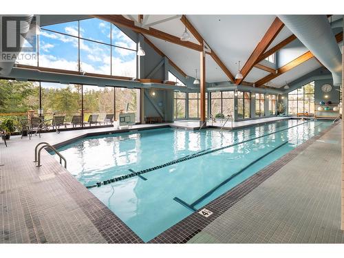 175 Predator Ridge Drive Unit# 6, Vernon, BC - Indoor Photo Showing Other Room With In Ground Pool