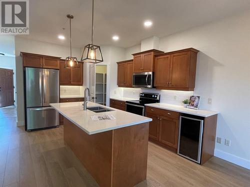 10634 Powley Court Unit# 202, Lake Country, BC - Indoor Photo Showing Kitchen With Double Sink