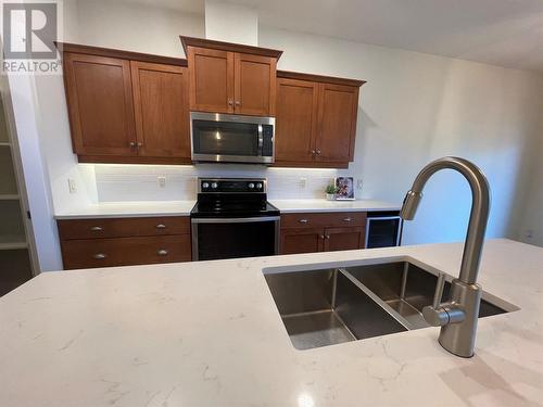 10634 Powley Court Unit# 202, Lake Country, BC - Indoor Photo Showing Kitchen With Double Sink