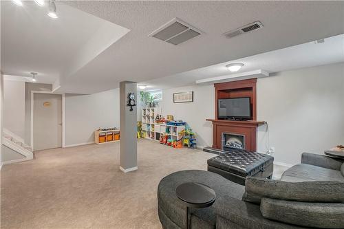 2188 Donald Road, Burlington, ON - Indoor Photo Showing Basement With Fireplace