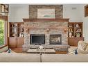 2037 Capistrano Drive, Kelowna, BC  - Indoor Photo Showing Living Room With Fireplace 