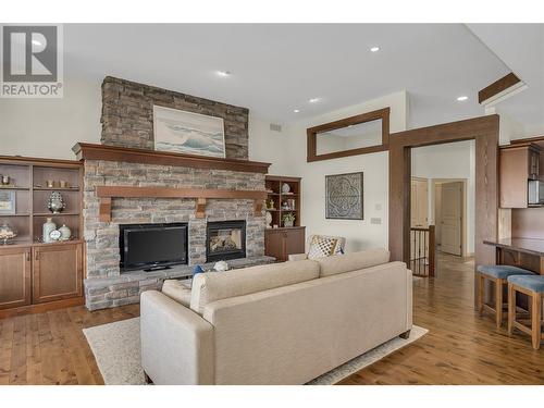 2037 Capistrano Drive, Kelowna, BC - Indoor Photo Showing Living Room With Fireplace