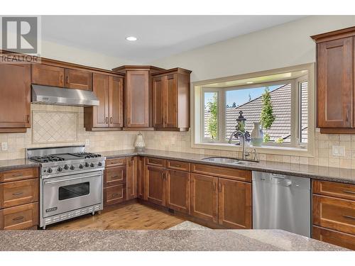 2037 Capistrano Drive, Kelowna, BC - Indoor Photo Showing Kitchen With Double Sink