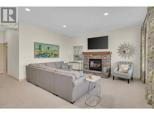 2037 Capistrano Drive, Kelowna, BC - Indoor Photo Showing Living Room With Fireplace