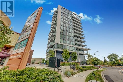 615 - 10 De Boers Drive, Toronto W05, ON - Outdoor With Balcony With Facade