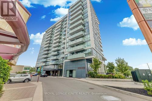 615 - 10 De Boers Drive, Toronto W05, ON - Outdoor With Balcony With Facade