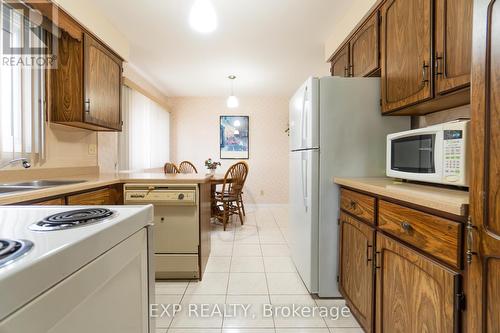 1666 Shale Oak Mews S, Mississauga (Rathwood), ON - Indoor Photo Showing Kitchen With Double Sink