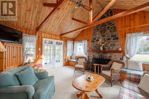 35 Campus Place, Innisfil, ON - Indoor Photo Showing Living Room With Fireplace