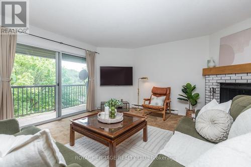 311 - 1102 Horseshoe Valley Road W, Oro-Medonte (Horseshoe Valley), ON - Indoor Photo Showing Living Room With Fireplace